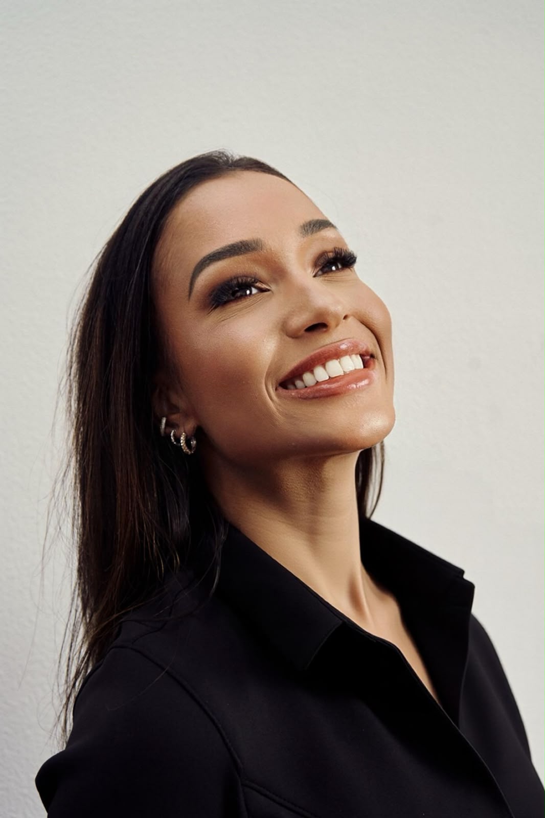 Ana Clara Assunção sorrindo, pronta para receber novos pacientes